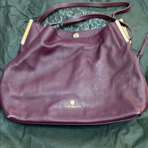 Purple leather bag with gold finishes